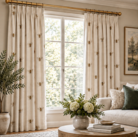 Custom pinch-pleat drapes with embroidered bees